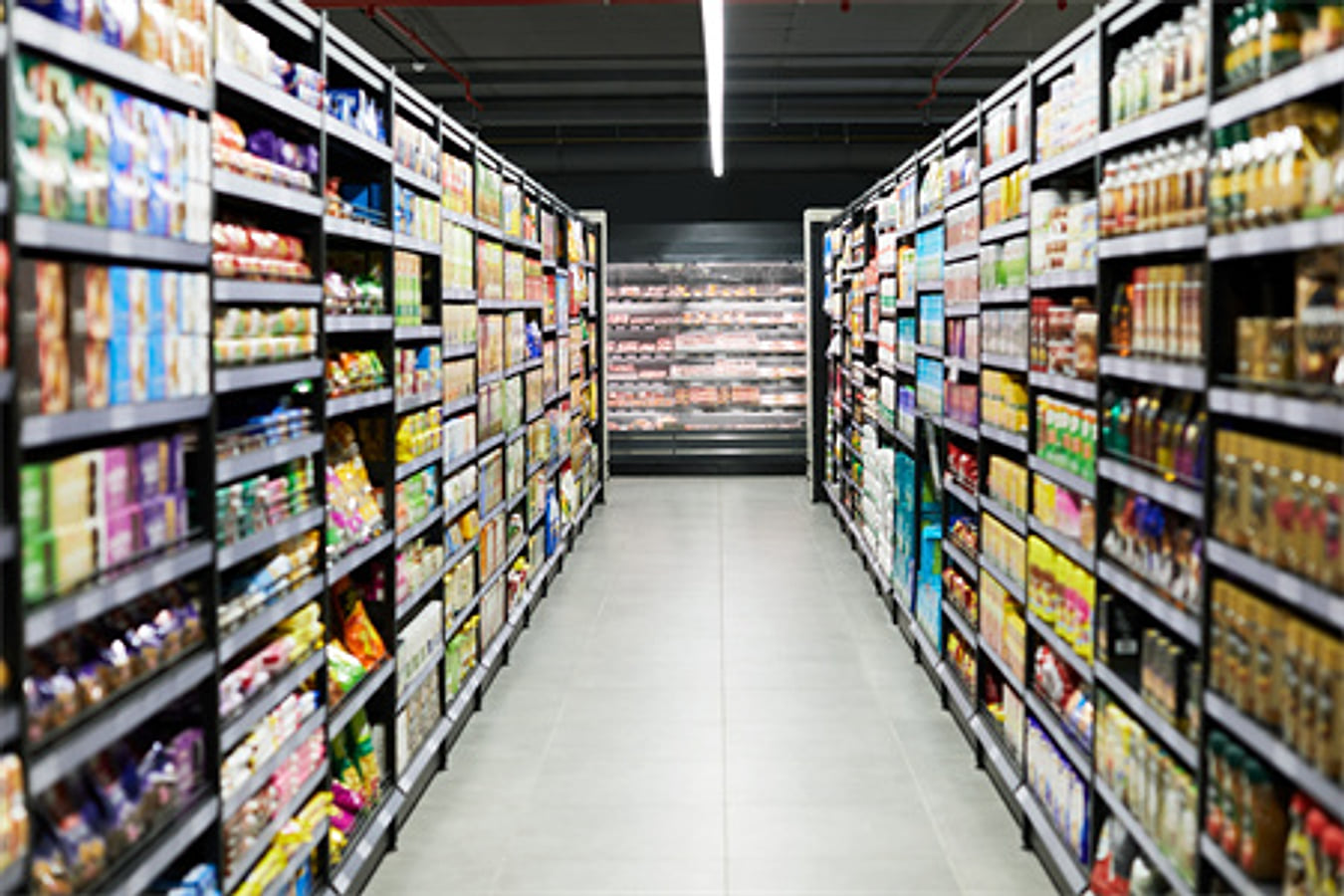 Retail aisle fitted with merchandise display shelves